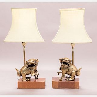 A Pair of Chinese Bronze Foo Dogs mounted as Table Lamps, 20th Century.