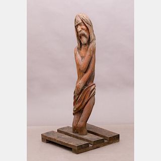 A Folk Art Carved Pine Figure of Jesus, 20th Century.
