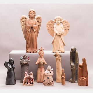 A Miscellaneous Collection of Eleven Ceramic and Wood Religious Figures, 20th Century.