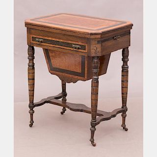 A Victorian Walnut Combination Game and Work Table, 19th Century.