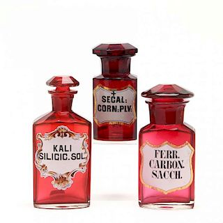 Group of Three Ruby Glass Apothecary Bottles 