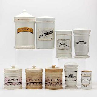 Group of Nine Porcelain Drug Ointment Jars 