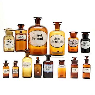 An Assembled Group of Amber Apothecary Bottles 