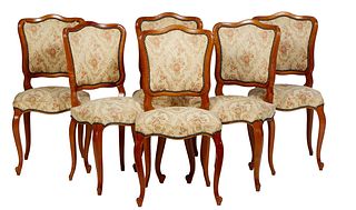 Set of Six French Louis XV Style Dining Chairs, 20th c., the canted arched cushioned back over a bowed trapezoidal cushioned seat, on scrolled cabriol