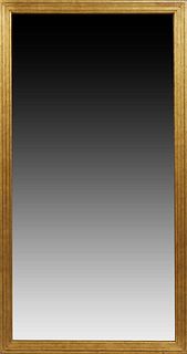 American Gilt and Gesso Overmantel Mirror, early 20th c., the wide reeded frame around a wide beveled plate, H.- 66 in., W.- 34 1/2 in., D.- 2 in. Pro