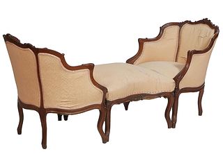 French Louis XV Style Carved Walnut Three Piece Duchesse Brissee, 20th c., consisting of a pair of bergeres, the arched C-scroll and floral carved cre