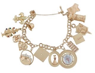 14K Yellow Gold Triple Link Charm Bracelet, with 14 charms, most 14K, L- 5 in., Wt.- 1.53 Troy Oz.