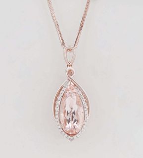 14K Rose Gold Pendant, with a 3.88 ct. pear shaped tanzanite within a conforming border of tiny round diamonds, on a rose gold flat herringbone chain,
