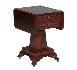American Classical Carved Mahogany Drop Leaf Work Table, 19th c., with two drawers on a square support to a stepped square base on pointed block legs,