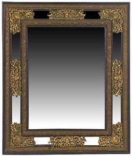 French Brass Overmantel Cushion Mirror, early 20th c., with a repousse leaf and berry frame around rectangular cushion mirrors with pierced brass over