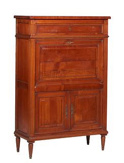 French Provincial Louis XVI Style Carved Cherry Secretary Abattant, 19th c., the ogee edge rectangular top over a frieze drawer above a fall front des