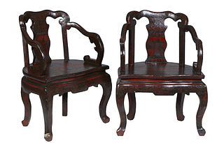 Pair of Chinese Export Lacquered Armchairs, late 19th c., the arched back and seat with incised figural and landscape decoration, flanked by serpentin
