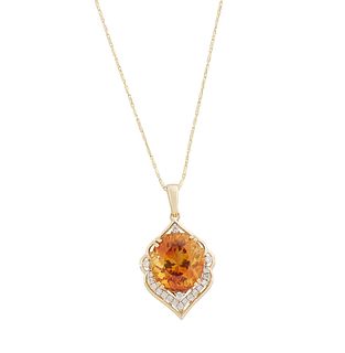 14K Yellow Gold Pendant, with an oval 14.85 ct. citrine atop a shaped border mounted with round diamonds, on a tiny twisted link 14K yellow gold chain