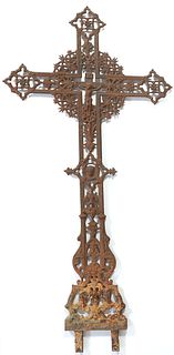 Large French Provincial Cast Iron Garden Cross, 19th c., with pierced arms and a central crucifix over a pierced support, H.- 59 in., W.- 29 1/4 in., 