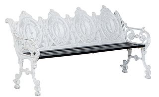 Cast Aluminum Four Seat Garden Bench, 20th c., with four pierced medallion backs over a slatted wood seat, flanked by pierced arms, on trestle support