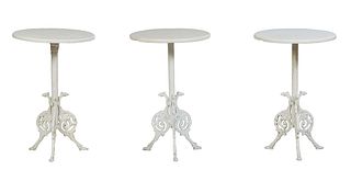 Three Cast Aluminum Marble Top Side Tables, 20th c., the circular white marble on a cylindrical support to three pierced gryphon topped spalyed legs, 
