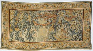 French Machine Made Tapestry, 20th c., of trees and flowers in a landscape, 4' 11 x 9' 4.