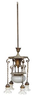 American Bronze and Glass Five Light Chandelier. c. 1930, with a conical brass center issuing four scrolled supports and a central frosted glass domed