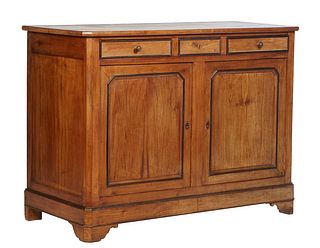 French Provincial Louis Philippe Carved Cherry Sideboard, late 19th c., the thick canted corner top over three setback frieze drawers above large doub