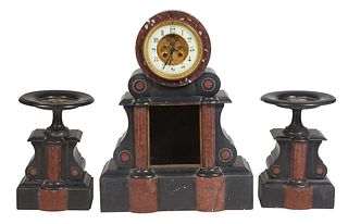 French Three Piece Inlaid Black and Rouge Marble Clock Set, c. 1870, the open escapement time and strike drum clock, with an enamel chapter ring, over