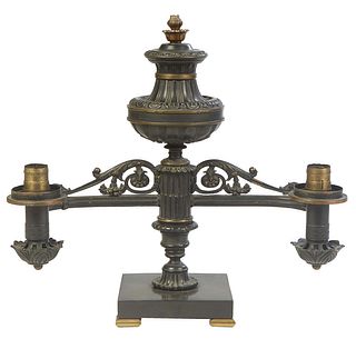 American Gilt and Patinated Bronze Double Argand Lamp, 19th c., with an urn form front issuing two pierced curved burner arms, on a square base on gil