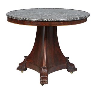 French Empire Style Carved Mahogany Marble Top Center Table, 19th c., the highly figured circular dished gray marble on a tapered concave triangular s