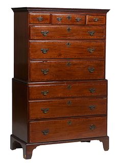 English Inlaid Banded Mahogany Chest-on-Chest, 19th c., the stepped dentillated crown over three frieze drawers above three graduated deep drawers, on