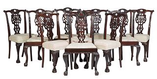 Set of Ten English Carved Mahogany Chippendale Style Dining Chairs, early 20th c., the arched back over vertical intertwined splats, above trapezoidal