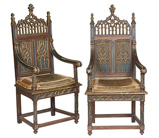 Pair of American Carved and Polychromed Oak Altar Chairs, 19th c., the peaked pierced Gothic arch crest, flanked by trefoil topped columns, over a Got