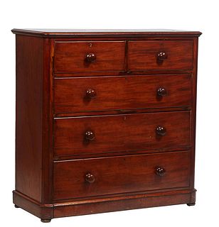 English Carved Mahogany Manor House Chest, 19th c., the rounded edge and corner top over two deep frieze drawers and three large deep drawers, all wit