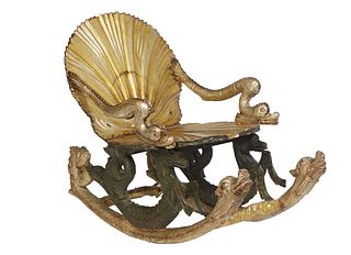 Venetian Sleigh Form Figural Grotto Rocking Chair, 19th c., the seashell carved plank seat and back panel with figural dolphin arms, on long carved ro