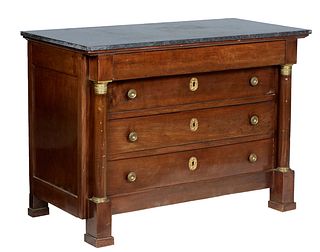 Exceptional French Empire Carved Walnut Marble Top Commode, 19th c., the highly figured rectangular black marble over a frieze drawer and three setbac