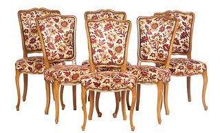 Set of Six French Louis XV Style Carved Beech Dining Chairs, 20th c., the arched canted upholstered back over a trapezoidal bowed cushioned seat, on s