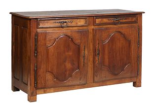 French Provincial Carved Oak Louis XIV Style Sideboard, 19th c., the stepped edge two board top over two large frieze drawers with iron escutcheons an
