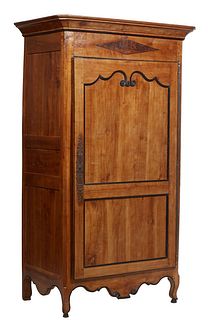 French Louis XV Style Carved Cherry Bonnetiere, 19th c., the ogee canted corner top over a large double panel door with a long iron fiche hinge and es