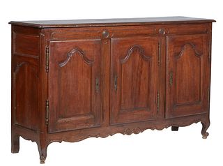 French Provincial Louis XV Style Caved Oak Sideboard, 19th c., the stepped rounded edge rectangular top over an incise carved frieze above three field