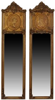 Pair of French Style Gilt Composition Pier Mirrors, 21st c., the arched shell form crest over a relief female bust medallion, above a wide beveled gla