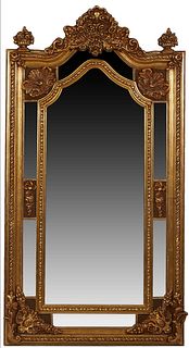 French Style Gilt Composition Overmantel Cushion Mirror, 20th/21st c., with an arched relief shell and floral basket crest over a beaded frame enclosi