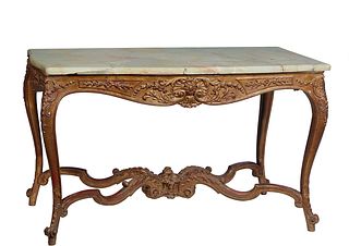 French Style Onyx Top Carved Mahogany Breakfast Table, 20th c., the highly figured serpentine green onyx, on a gilt oak base with an arched skirt and 