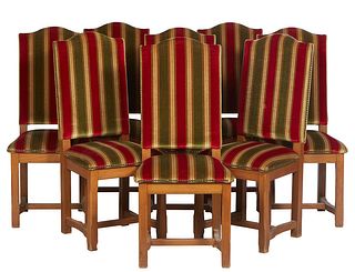 Set of Eight French Provincial Louis XIII Style Carved Beech Dining Chairs, 20th c., the tall arched backs to square seats over a wide skirt to square