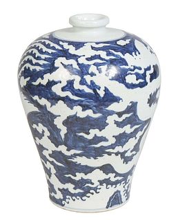 Large Chinese Blue and White Meiping Porcelain Baluster Vase, 20th c., with a short everted neck over sides with winged dragons and clouds, H.- 16 in.
