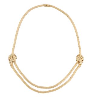 18K Yellow Gold Necklace, with flat links, and two white and yellow gold leaf form enhancers, L.- 15 in., wt.- 1.36 troy oz.