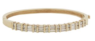 14K Yellow Gold and Diamond Hinged Bangle Bracelet, mounted with eight vertical rows of two seven point round diamonds, flanked by vertical gold space
