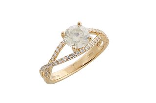 Lady's 18K Yellow Gold Dinner Ring, with a 1.04 carat round diamond atop a twisted pierced band mounted with tiny round diamonds, diamond accent weigh