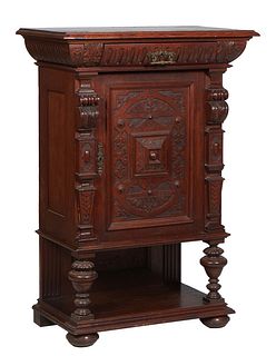 Continental Carved Oak Renaissance Style Cabinet, 19th c., the stepped top over a convex frieze drawer above a setback cupboard door with applied carv