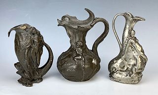 Three Art Nouveau Metal Pitchers C. 1900