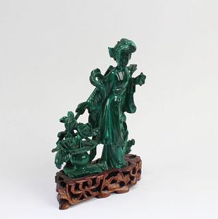 A Carved Malachite Figurine With stand
