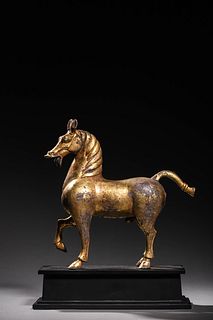 Tang: A Gilt Bronze Horse Statue