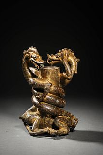 Tang Dynasty: A Gilt Bronze Gradon Figurine