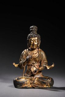 Tang: A Gilt Bronze Seeated Buddha Statue